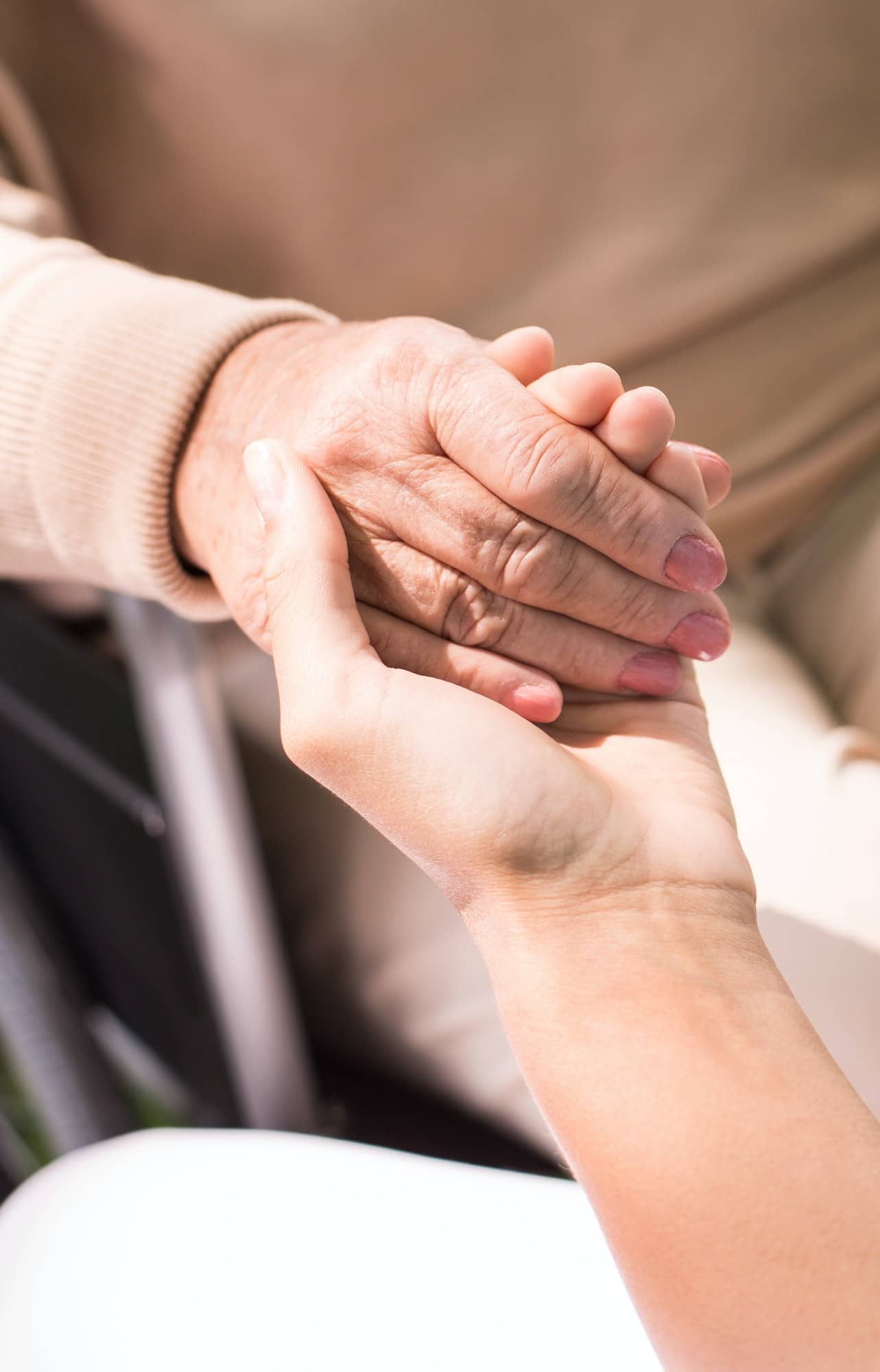 Holding patient's hand